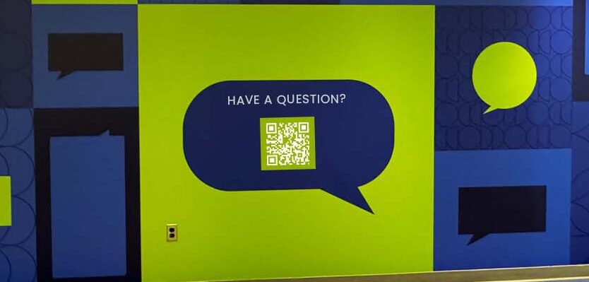 Retail businesses can use interactive design elements like scannable QR codes to engage customers as they shop